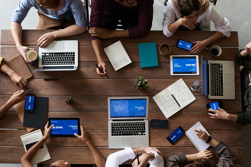 Top perspective on table with computers